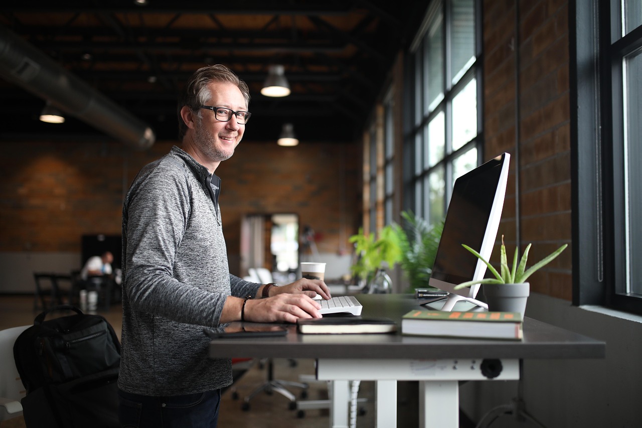 Office desk, man, business — Freedom Forever Solar Reviews Highlight the State of Solar Data Governance in 2025: Building a S